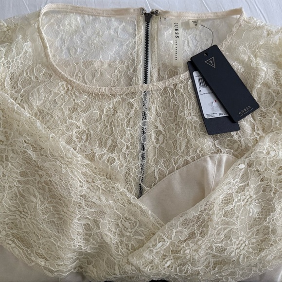 NOT FOR SALE
GUESS PEPLUM BLOUSE TOP
CREAM LONG SLEEVE BACK ZIP - Picture 5 of 12